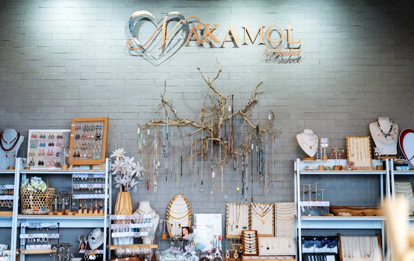 Nakamol Phuket shop interior with the Nakamol sign and jewelry displays